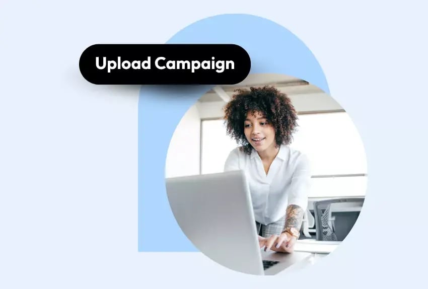 Woman working on a laptop under a “Upload Campaign” label.